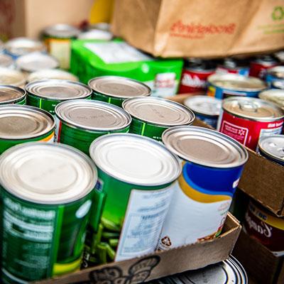 Cans of food delivered to a food drive.